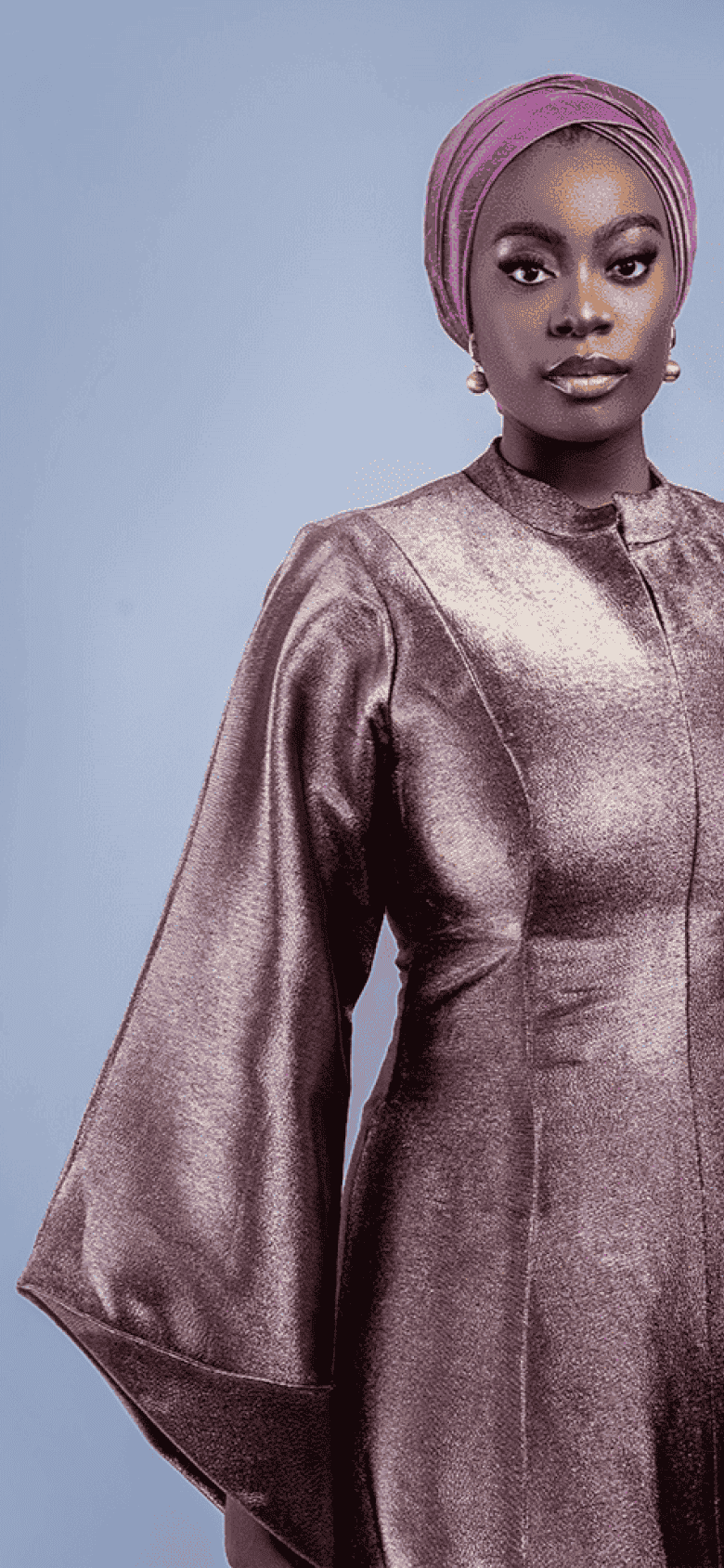 Model in mauve metallic kaftan